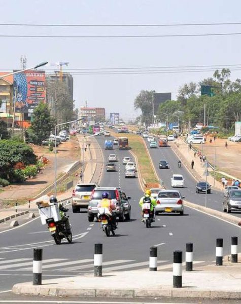 DNNGONGROAD1601a Bollards along the raised central median of the dual carriage way
